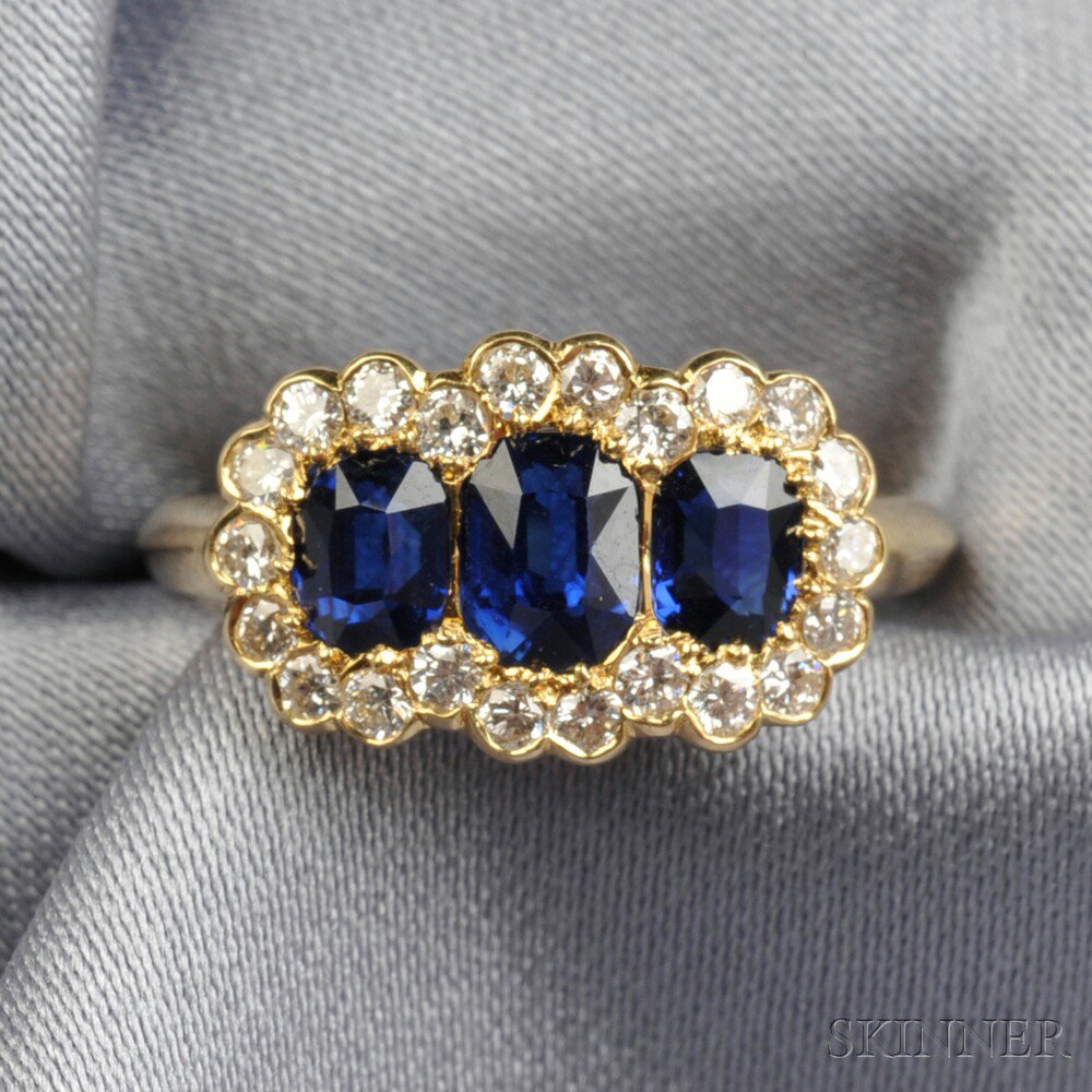 Appraisal: kt Gold Sapphire and Diamond Ring set with three cushion-cut