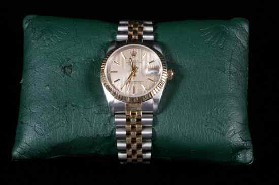 Appraisal: LADY'S K YELLOW GOLD AND STAINLESS STEEL OYSTER PERPETUAL DATEJUST