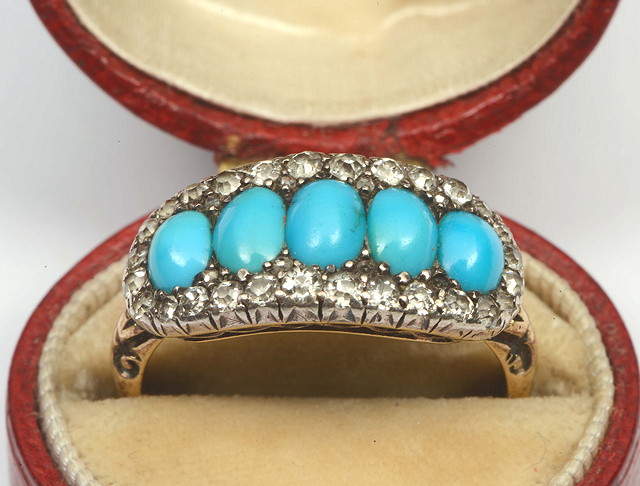 Appraisal: A VICTORIAN TURQUOISE AND DIAMOND SET DRESS RING graduated oval