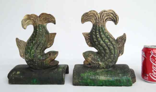 Appraisal: Pair Asian pottery stylized fish roof tiles '' Length ''