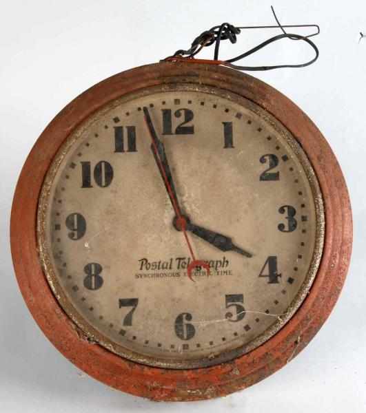 Appraisal: Postal Telegraph Electric Clock Description Moderate rust Condition Good Size