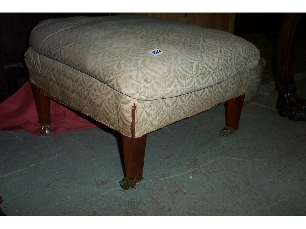 Appraisal: An Edwardian footstool of square cut form with upholstered top