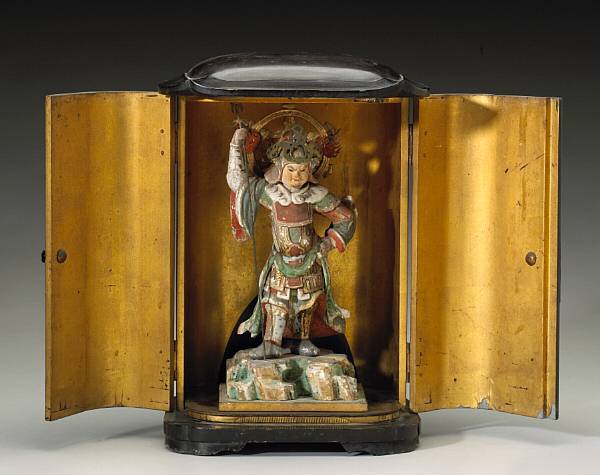 Appraisal: A lacquered wood zushi th Century The black lacquer shrine