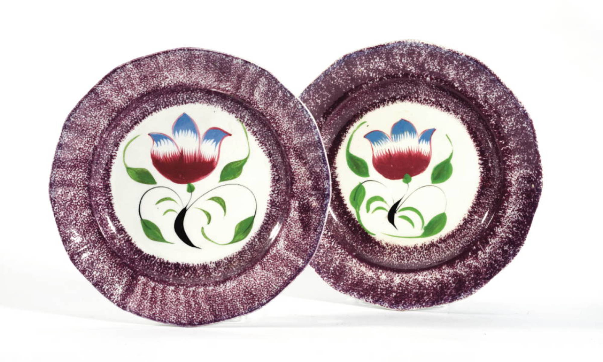 Appraisal: PAIR OF STAFFORDSHIRE PURPLE SPATTERWARE quot PROFILE TULIP quot PATTERN