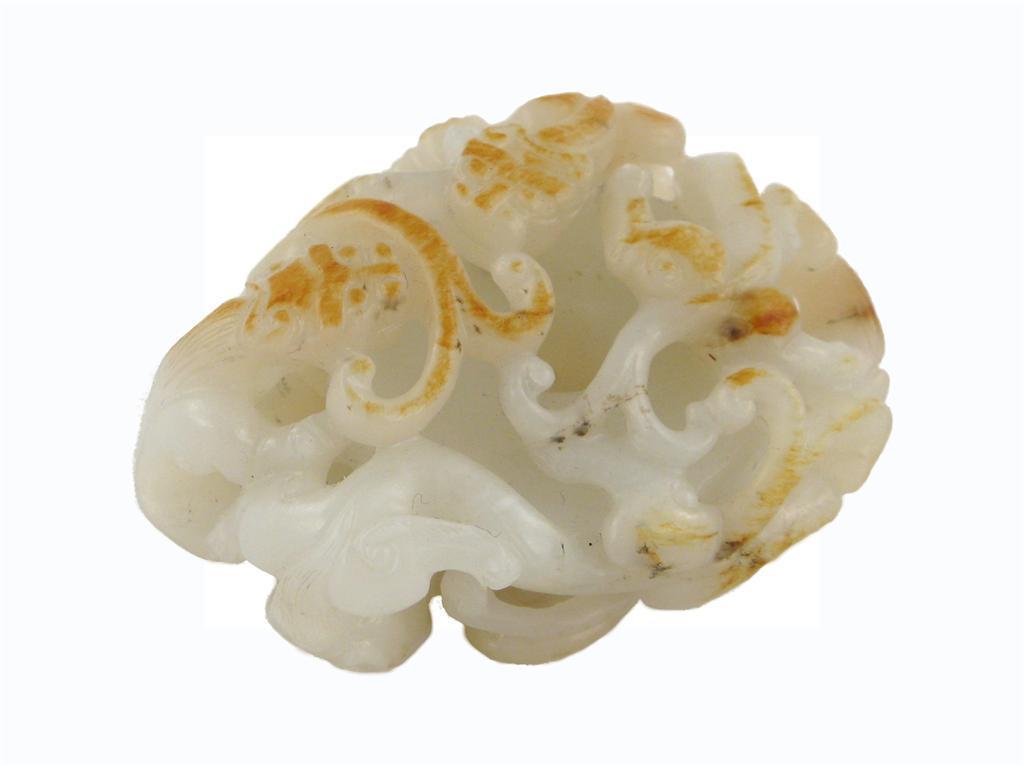 Appraisal: A Chinese white jade carving of a bi disc