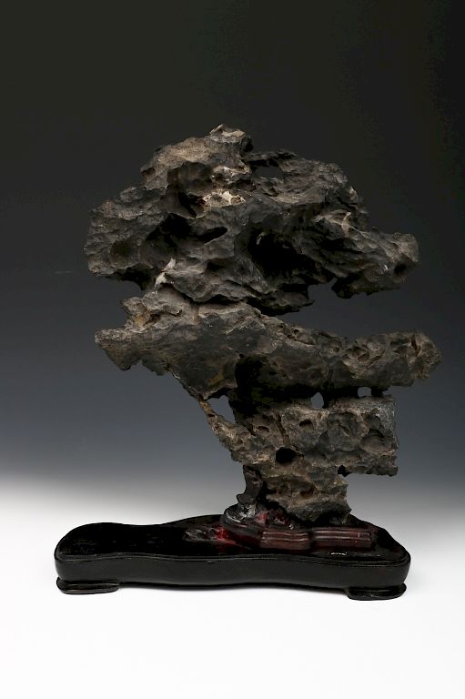 Appraisal: CHINESE YING SCHOLAR'S ROCK The rock accented with ridges and