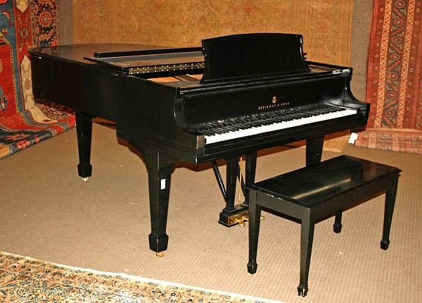 Appraisal: A Steinway ebonized grand piano together with bench Model L