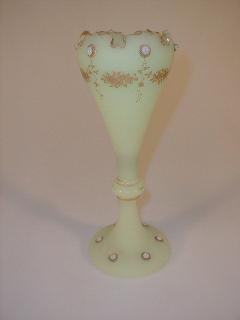 Appraisal: A thC pale green frosted glass vase the slender tapering