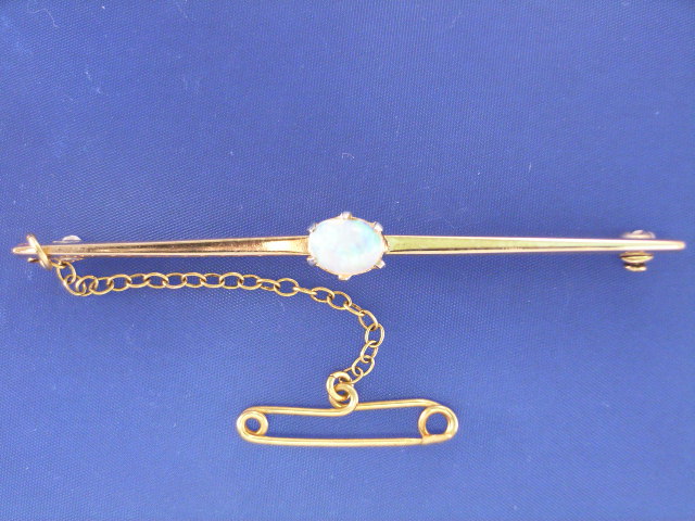 Appraisal: A vintage ct gold opal bar brooch length mm gms