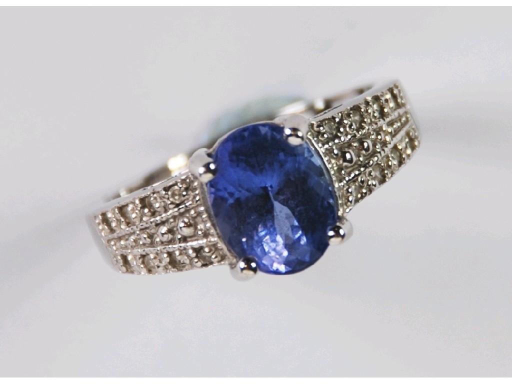 Appraisal: k WHITE GOLD RING SET WITH AN OVAL TANZANITE of