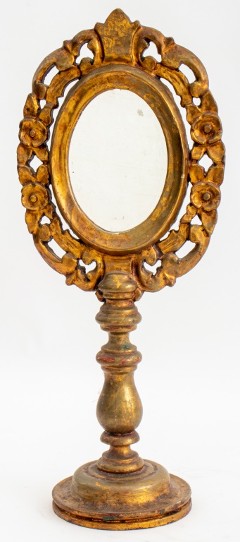 Appraisal: BAROQUE STYLE CARVED GILTWOOD TABLE MIRROR Baroque style carved giltwood