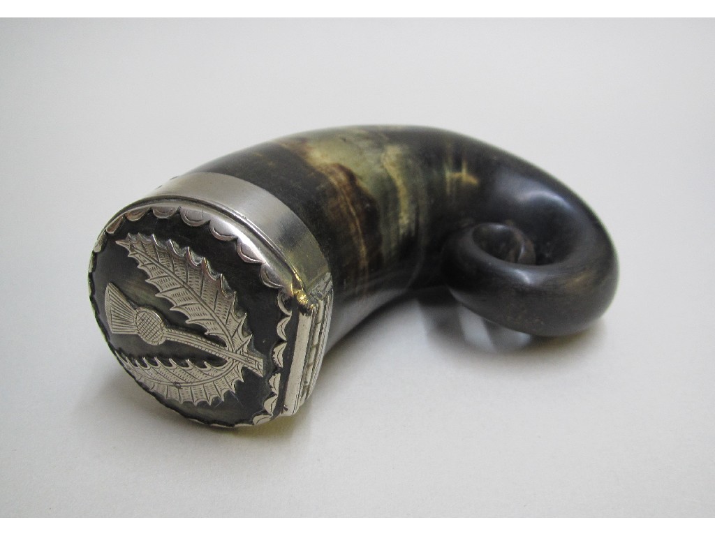 Appraisal: A ram's horn snuff mull the hinged white metal mounted