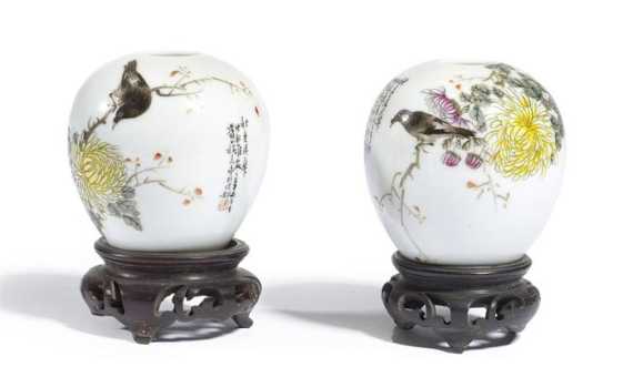 Appraisal: A PAIR OF SMALL OVOID VASES WITH CHRYSANTHEMUM DESIGN China