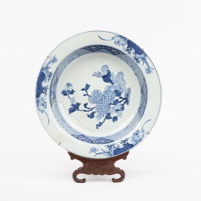 Appraisal: An th Century Kangxi blue and white bowl decorated three