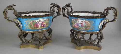 Appraisal: A pair of th Century Sevres porcelain two-handled jardinieres probably