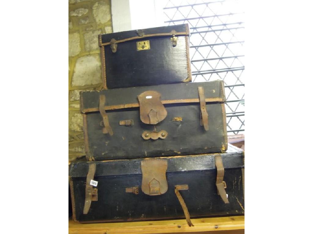 Appraisal: Three vintage canvas and leather bound travelling trunks cases together