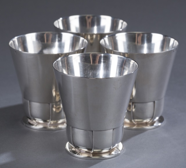 Appraisal: Four Jean Emile Puiforcat Art Deco Silver Cups Marked Jean