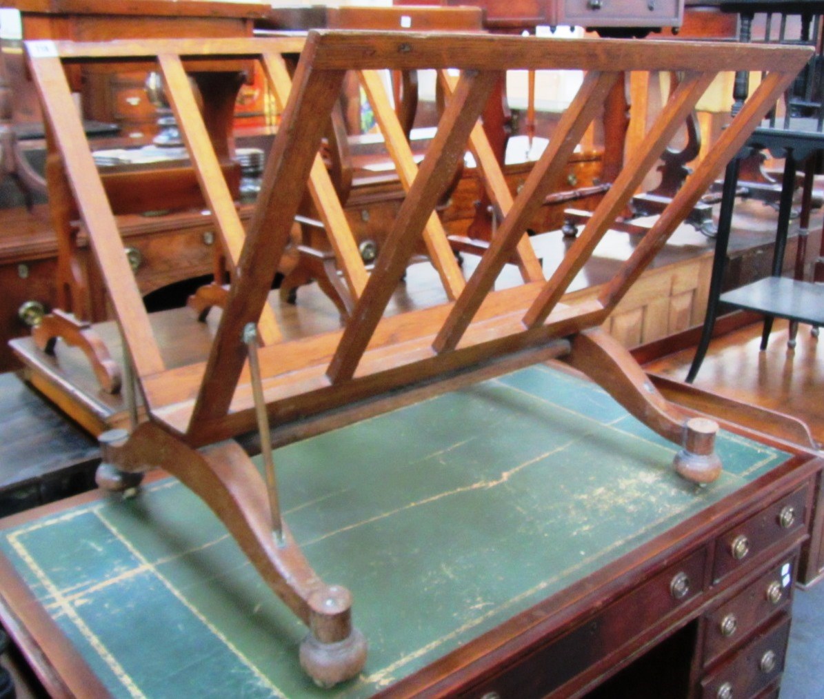 Appraisal: A th century oak folio stand of open slatted construction