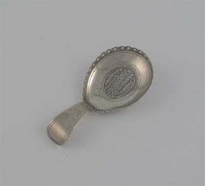 Appraisal: A George III engraved caddy spoon with a pierced rim