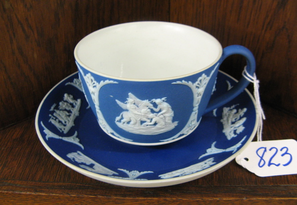 Appraisal: AN ENGLISH VICTORIAN BLUE JASPERWARE CUP AND SAUCER with white