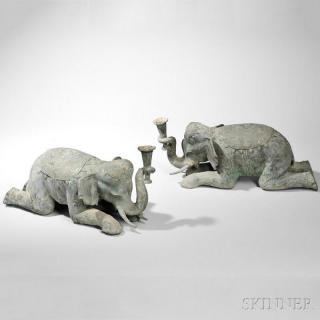 Appraisal: Pair of Bronze Elephant Candlesticks India th century depicted kneeling