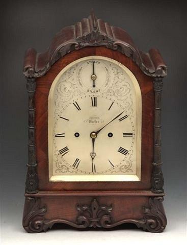 Appraisal: A VICTORIAN MAHOGANY BRACKET CLOCK having an arched silvered dial