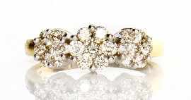 Appraisal: An ct gold diamond cluster ring estimated total diamond weight