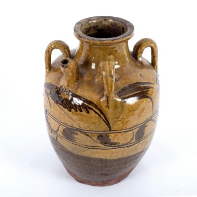 Appraisal: A th Century South European earthenware urn with four lug