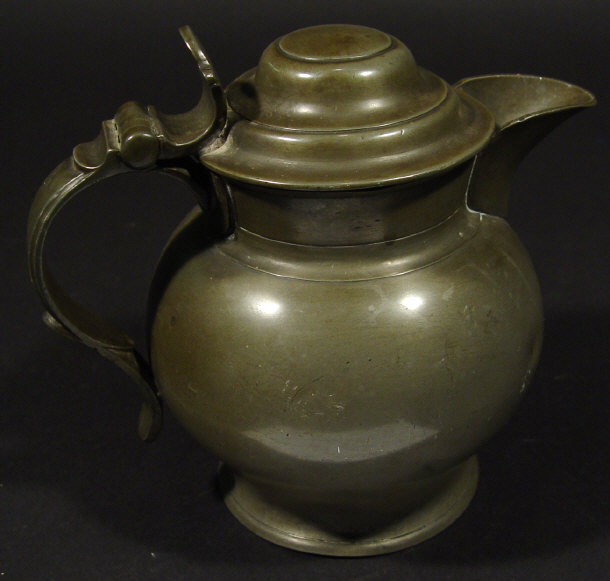 Appraisal: th Century pewter flagon with hinged lid and inscribed marks