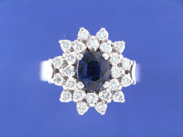 Appraisal: An ct white gold sapphire and diamond cluster ring estimated