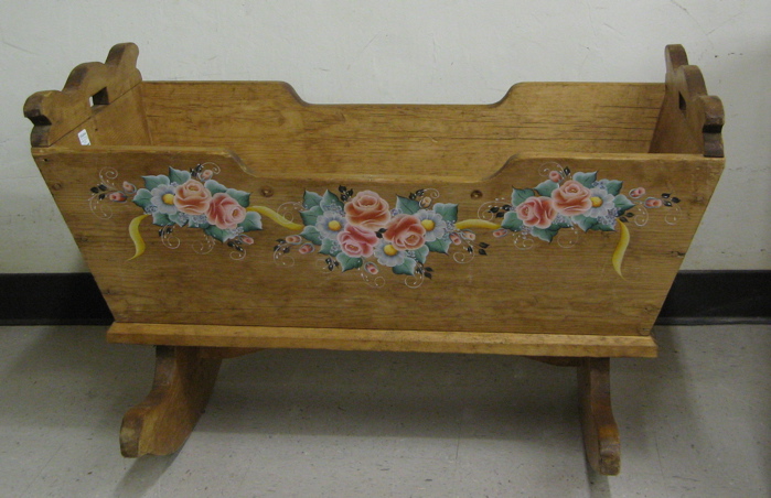 Appraisal: A ROCKING PINE CRADLE Continental th century elements Length inches