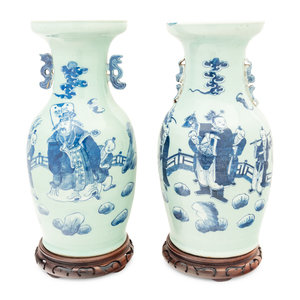 Appraisal: A Pair of Chinese Porcelain Vases th Century with wood