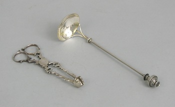 Appraisal: A Pair of Georgian Silver Sugar Nips English ca pre-