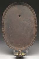 Appraisal: TIN OVAL SCONCE The pie crimped edge oval reflector with