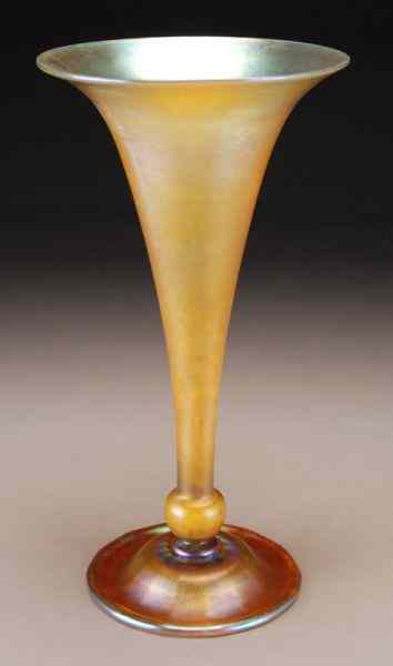 Appraisal: Tiffany gold Favrile glass trumpet vase The knopped trumpet form