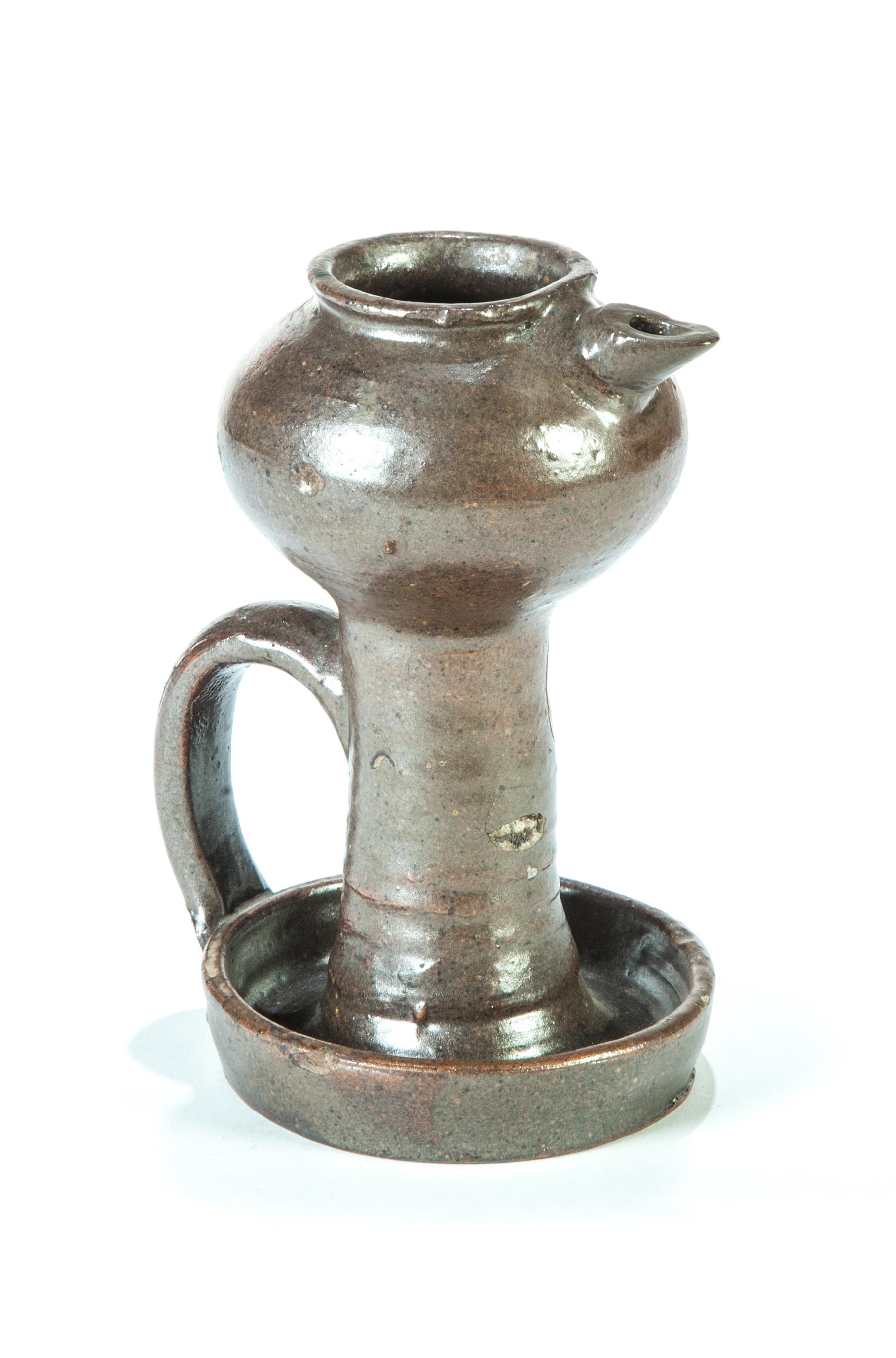 Appraisal: STONEWARE OIL LAMP Probably Ohio th century Similar to lamps