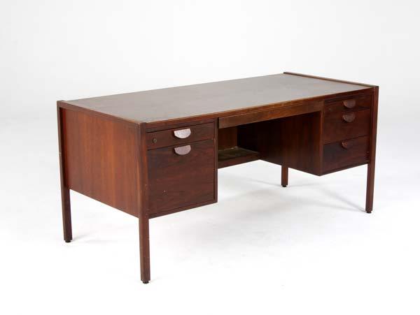 Appraisal: JENS RISOM Walnut six-drawer desk x x