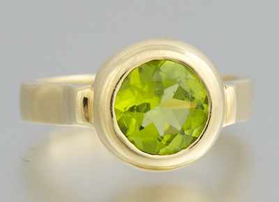 Appraisal: A Ladies' Peridot Ring Signed R Benatar k yellow gold