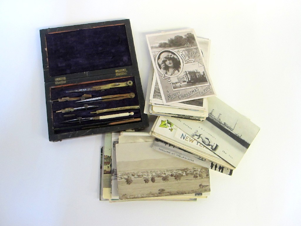 Appraisal: A box of postcards and a set of drawing instruments