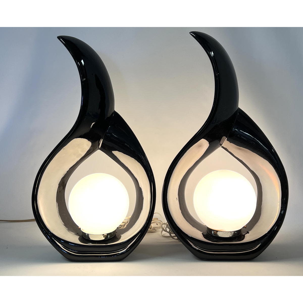 Appraisal: Pr Black Glazed Modernist Teardrop form Table Lamps Round Ball