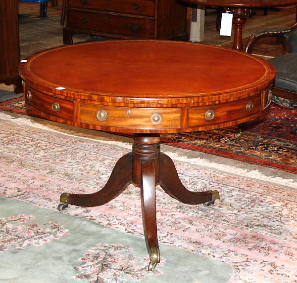 Appraisal: A George III style mahogany and leather drum table th