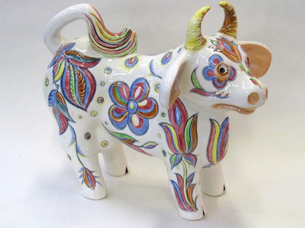 Appraisal: Wedgwood pottery figure of a cow with brightly coloured floral