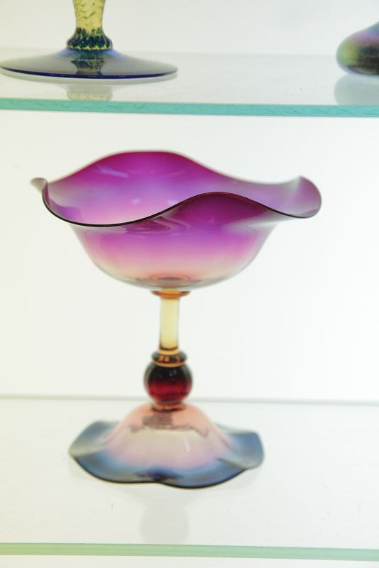 Appraisal: AMBERINA COMPOTE Attributed to Libbey Fuschia colored and ruffled bowl