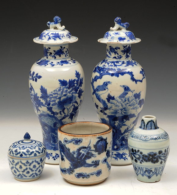 Appraisal: A CHINESE BLUE AND WHITE CRACKLEWARE BRUSH HOLDER decorated with