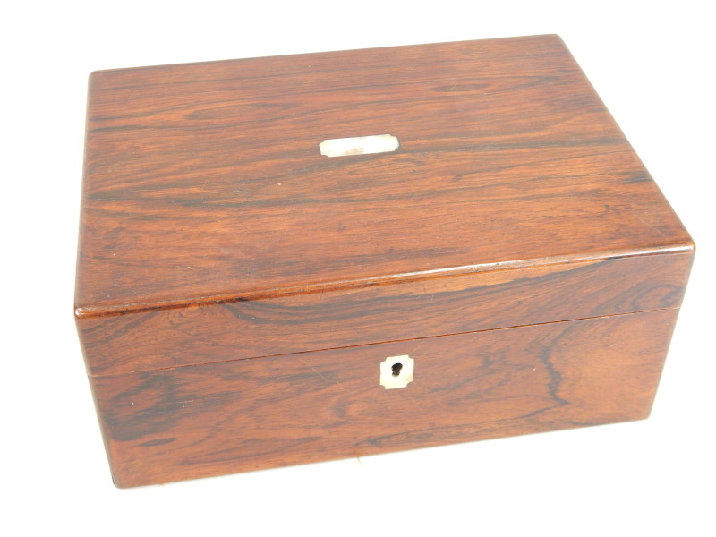 Appraisal: A Victorian rosewood workbox the top inlaid with a rectangular