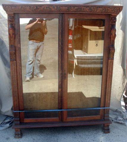 Appraisal: Victorian Oak Door Bookcase With carved Griffin heads Possibly Horner