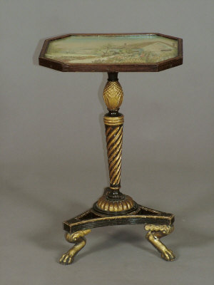 Appraisal: A gilt and ebonised octagonal tripod table th century and