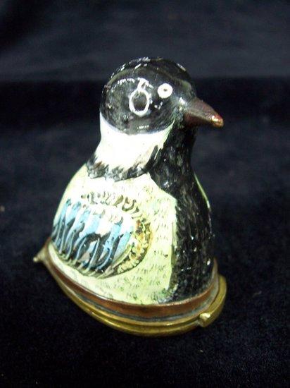 Appraisal: An enamel snuff box modelled and painted as a bird