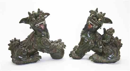 Appraisal: A Pair of Chinese Ceramic Fu Dogs each with polychrome