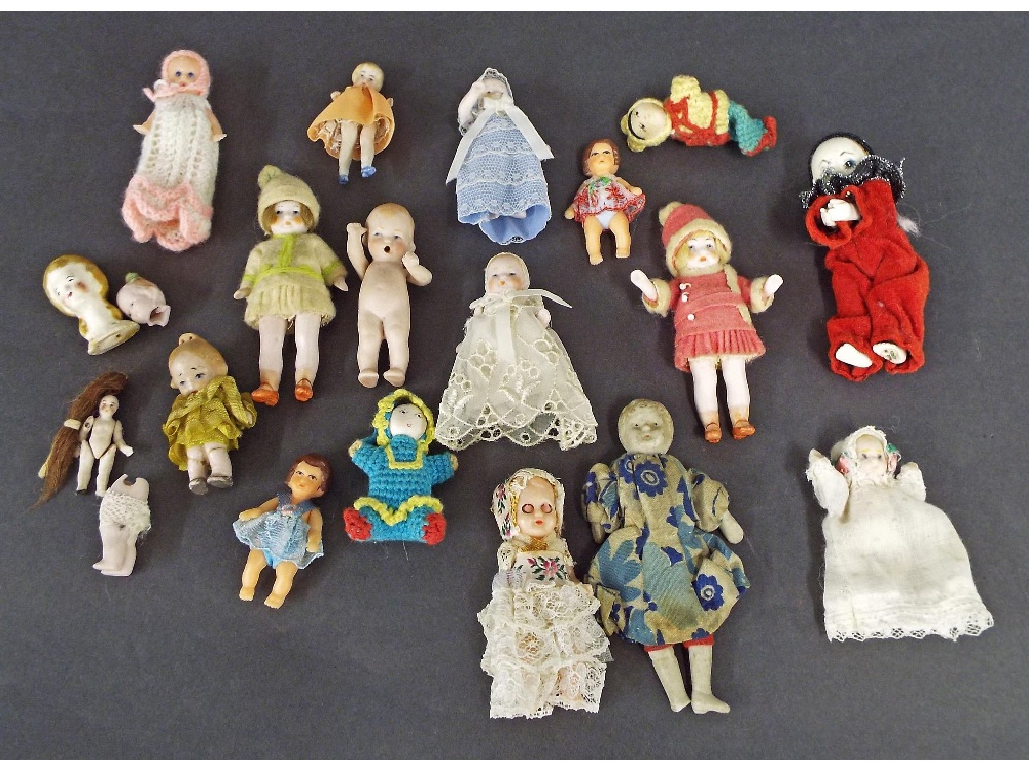 Appraisal: Collection of miniature dolls to include eleven porcelain dolls and